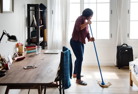 black-woman-cleaning-room-2022-12-16-00-19-57-utc