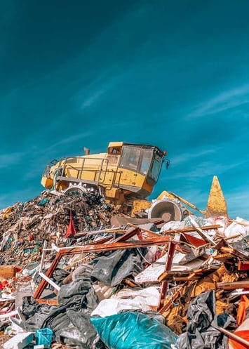 bulldozer-compactor-working-at-a-landfill-web
