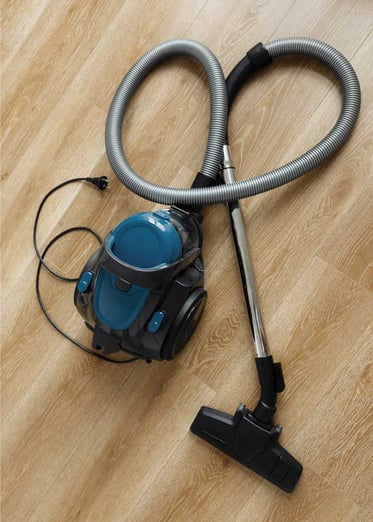 modern-blue-vacuum-cleaner-on-the-wooden-floor-in-web-utc