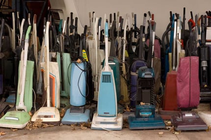 picture-of-old-handheld-vacuum-cleaners-covered-web