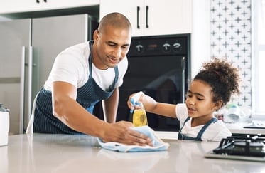 shot-of-a-young-man-cleaning-a-surface-with-a-chil-2023-01-12-22-50-44-utc